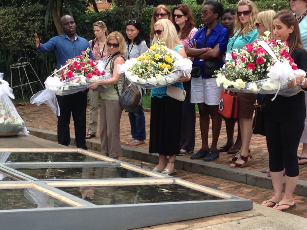 Mentors lay wreaths at Kigali Memorial Centre