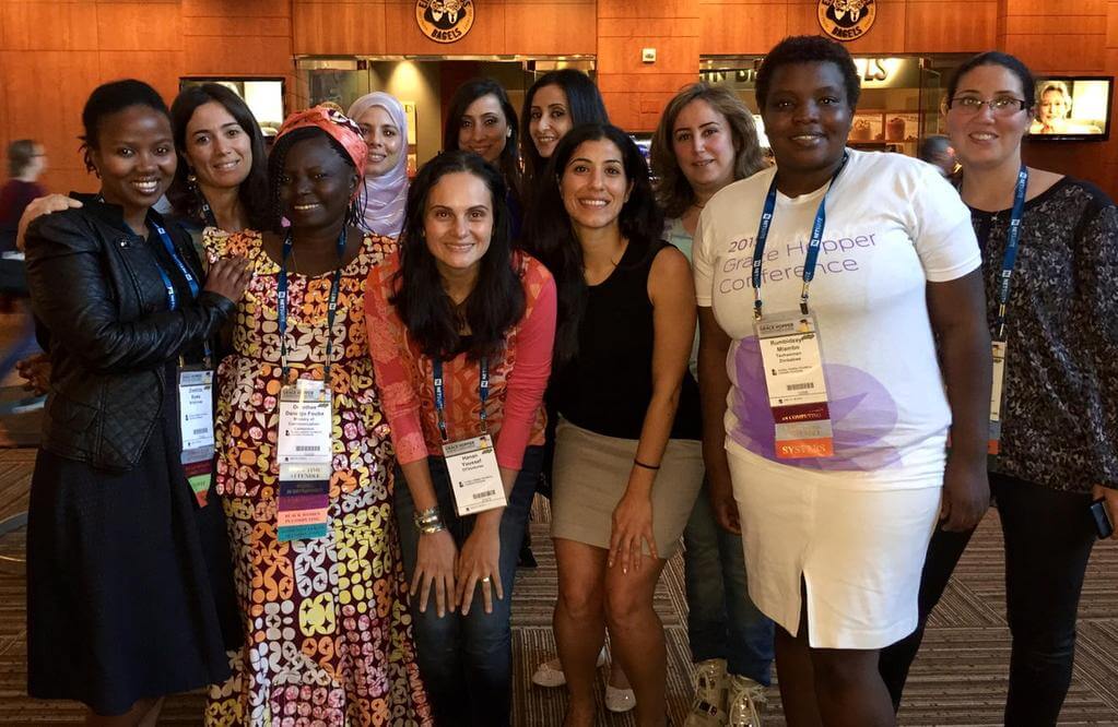 TechWomen fellows with program director Arezoo Riahi at the 2015 Grace Hopper Celebration in Houston, Texas.